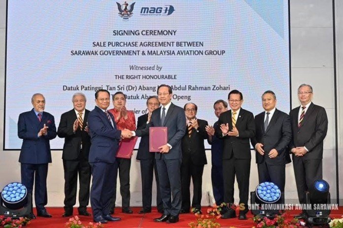 Abang Johari (back row, centre) witnessing the exchange of SPA between the Sarawak government and Malaysia Aviation Group (MAG) on the acquisition of MASwings held at a hotel here on Feb 12, 2025. Photo credit: Ukas