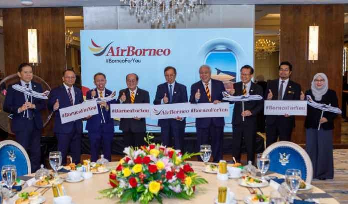 Abang Johari (fifth left) and other dignitaries photographed during the unveiling of AirBorneo’s “Wings of Unity” logo at Satria Pertiwi Complex on Aug 21, 2025.