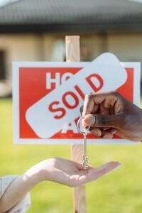 close up photo of a hands and a key